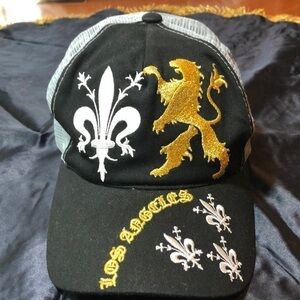  — Black /grey hat with white/gold embroidery.